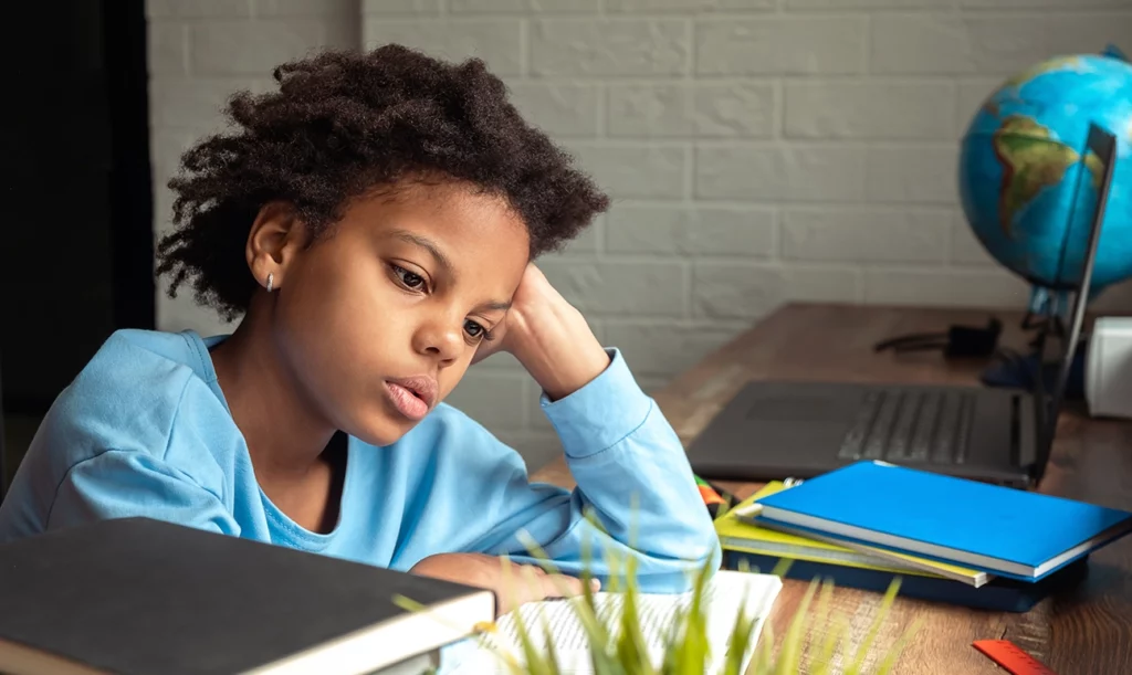 Stressed Child doing homework